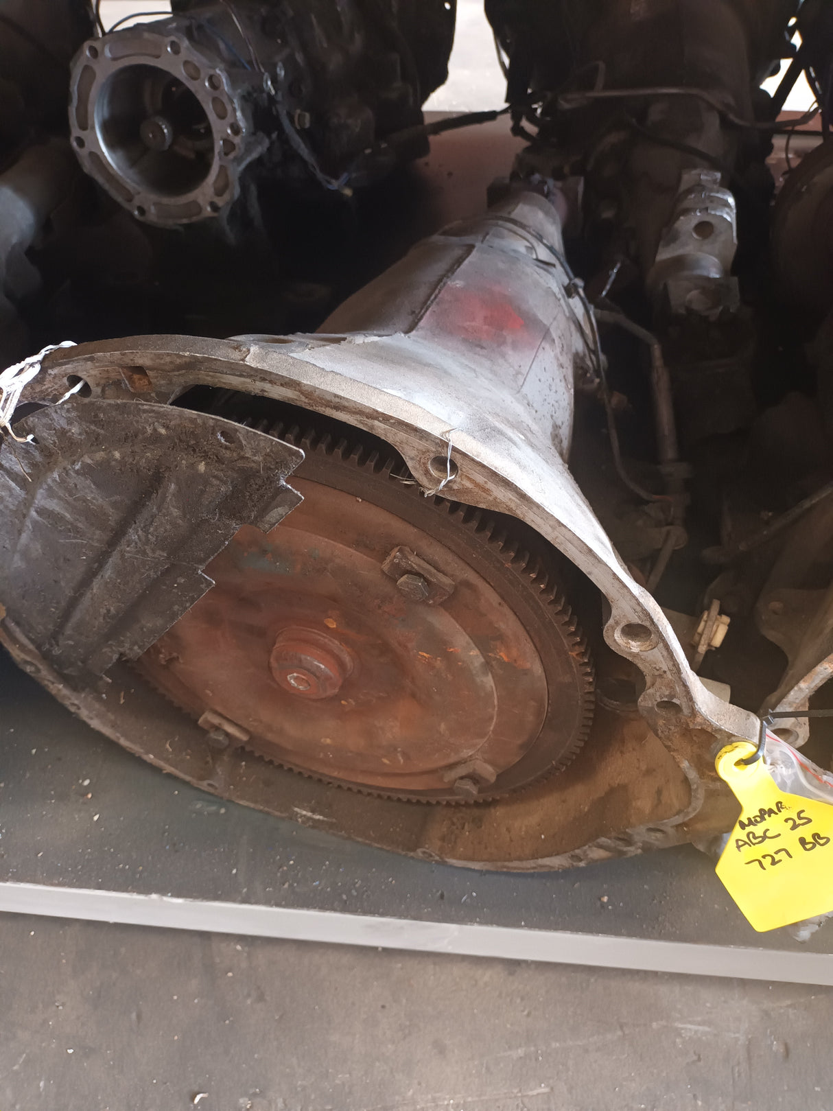 CHRYSLER TRANSMISSION 727 BB SHORT TAIL. IN REBUILDABLE CONDITION